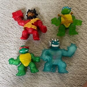 Hero’s of goo jit zu Ninja Turtle Action Figure plus two other characters